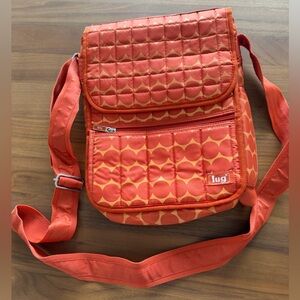 Lug Quilted Orange Crossbody Organizer Bag. Interior & exterior pockets.